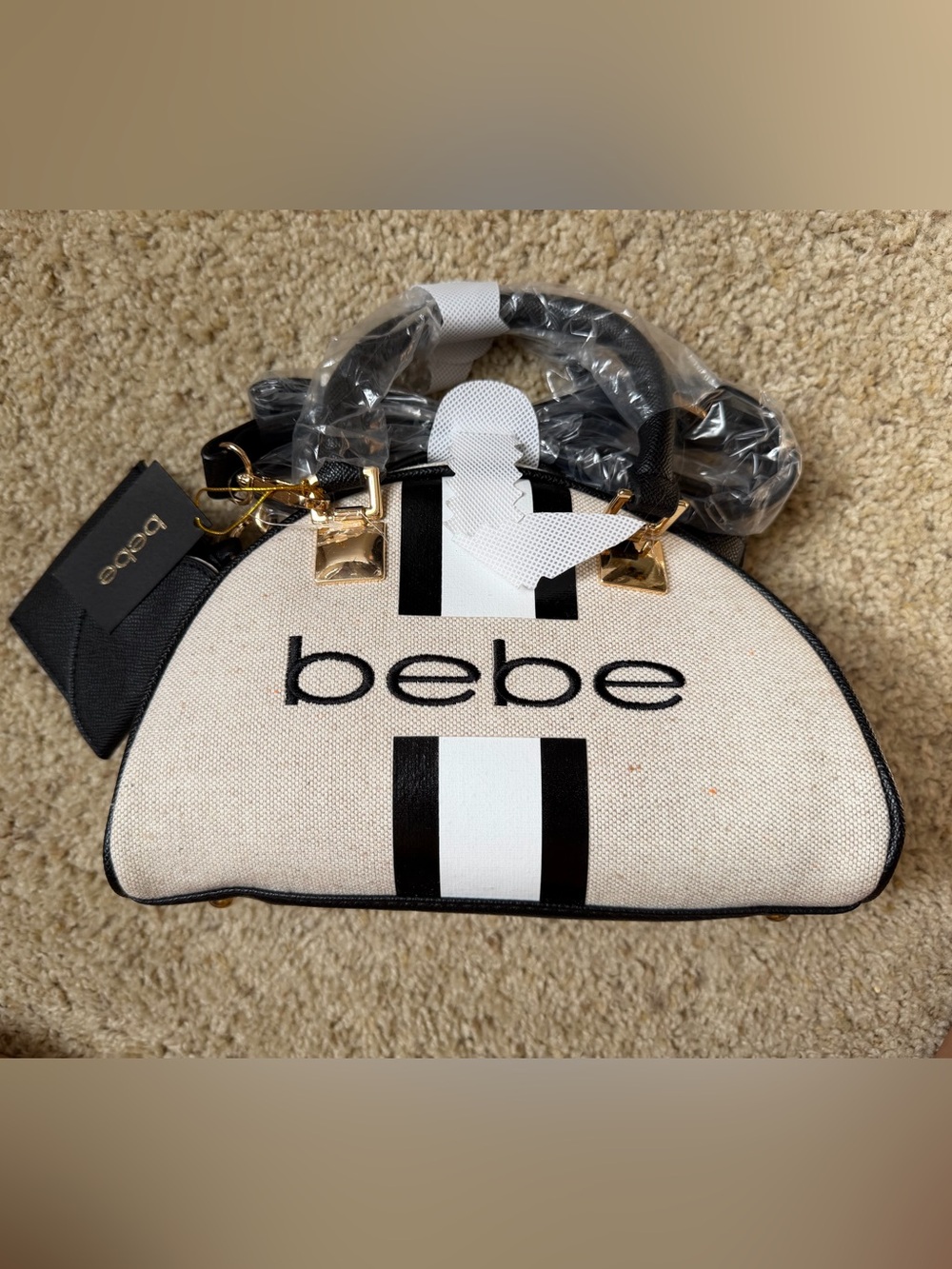 bebe Cream and Black Dome Satchel with White Stripe